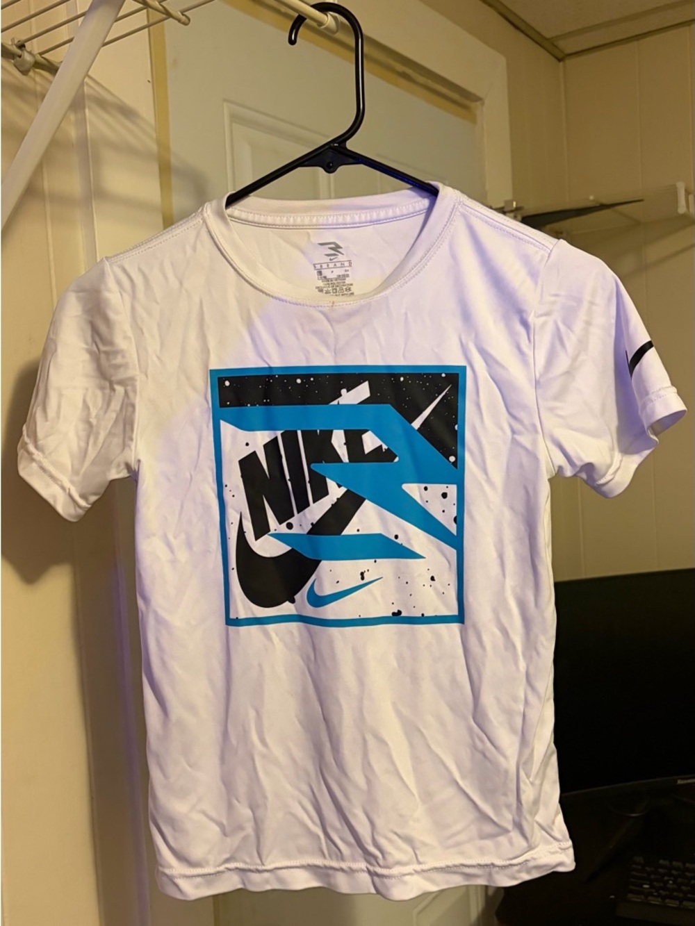 Nike White Graphic Logo Tee with Blue Accents